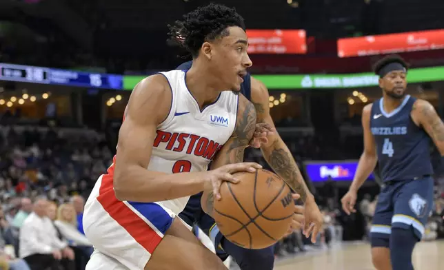 Detroit Pistons guard Jared Rhoden drives against the Memphis Grizzlies during the first half of an NBA basketball game Friday, April 5, 2024, in Memphis, Tenn. (AP Photo/Brandon Dill)