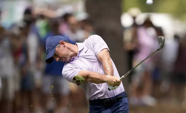 Rory McIlroy, of Northern Ireland, hits from the fairway on the first hole during the final round of the RBC Heritage golf tournament, Sunday, April 21, 2024, in Hilton Head Island, S.C. (AP Photo/Chris Carlson)