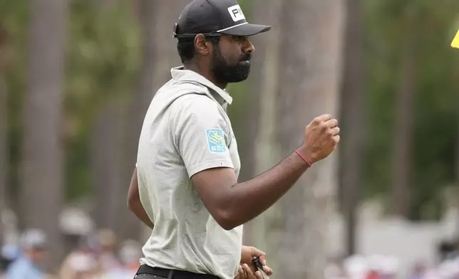 Sahith Theegala celebrates after a birdie on the ninth hole during the final round of the RBC Heritage golf tournament, Sunday, April 21, 2024, in Hilton Head Island, S.C. (AP Photo/Chris Carlson)