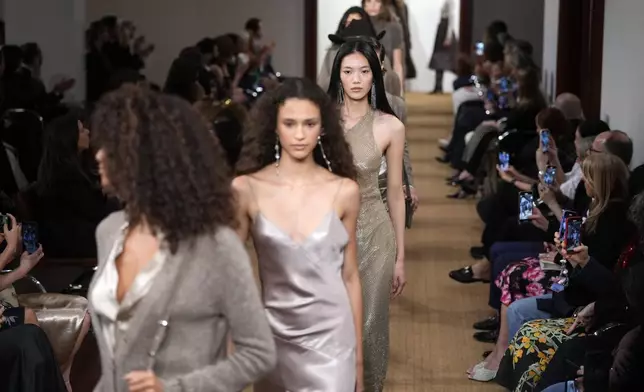 Models walk the runway during the Ralph Lauren Fall/Holiday 2024 presentation on Monday, April 29, 2024, in New York. (Photo by Charles Sykes/Invision/AP)