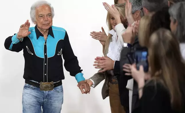 Ralph Lauren walks the runway at the conclusion of his Ralph Lauren Fall/Holiday 2024 presentation on Monday, April 29, 2024, in New York. (Photo by Charles Sykes/Invision/AP)