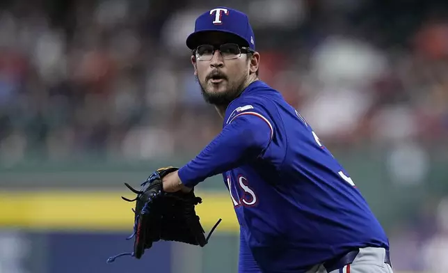 Texas Rangers starting pitcher Dane Dunning delivers during the first inning of a baseball game against the Houston Astros Friday, April 12, 2024, in Houston. (AP Photo/Kevin M. Cox)