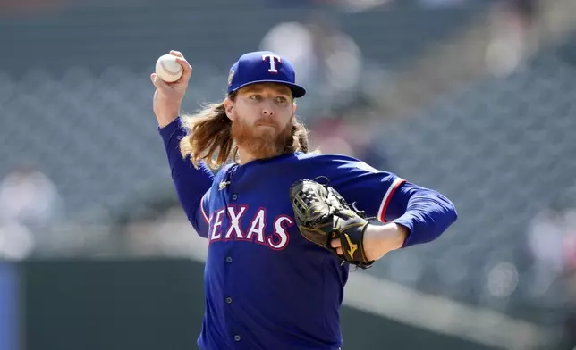 Texas Rangers pitcher Jon Gray throws during the second inning of a baseball game against the Detroit Tigers, Tuesday, April 16, 2024, in Detroit. (AP Photo/Carlos Osorio)