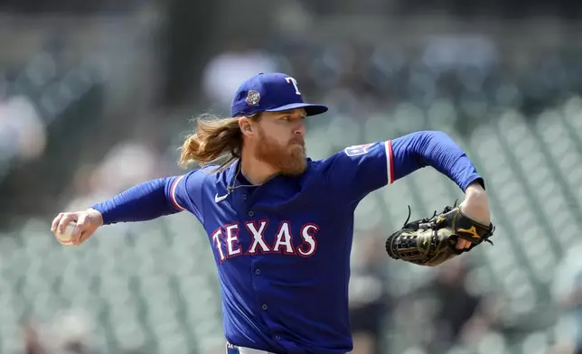 Texas Rangers pitcher Jon Gray throws during the first inning of a baseball game against the Detroit Tigers, Tuesday, April 16, 2024, in Detroit. (AP Photo/Carlos Osorio)