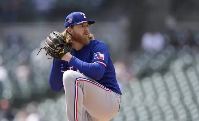Texas Rangers pitcher Jon Gray throws during the first inning of a baseball game against the Detroit Tigers, Tuesday, April 16, 2024, in Detroit. (AP Photo/Carlos Osorio)