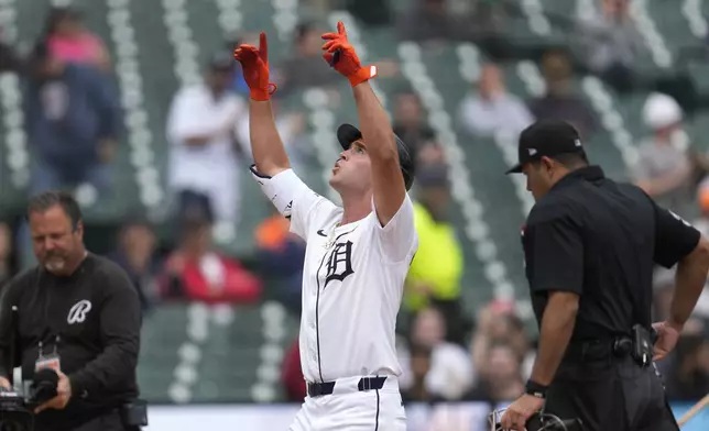 Detroit Tigers' Kerry Carpenter celebrates his home run against the Texas Rangers in the second inning of a baseball game, Wednesday, April 17, 2024, in Detroit. (AP Photo/Paul Sancya)