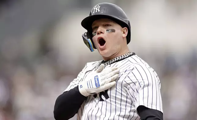 New York Yankees' Alex Verdugo reacts after hitting a two run-scoring single against the Tampa Bay Rays during the fifth inning of a baseball game Sunday, April 21, 2024, in New York. (AP Photo/Adam Hunger)