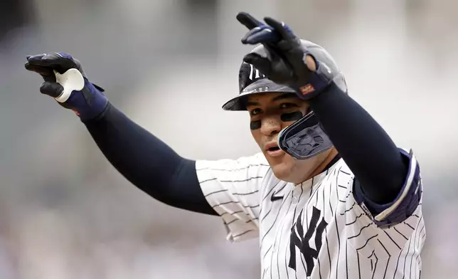 New York Yankees' Jose Trevino reacts after hitting a run-scoring single against the Tampa Bay Rays during the fifth inning of a baseball game Sunday, April 21, 2024, in New York. (AP Photo/Adam Hunger)