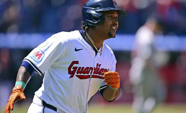 Cleveland Guardians' Jose Ramirez runs the bases after hitting a grand slam off Boston Red Sox starting pitcher Chase Anderson during the second inning of a baseball game, Thursday, April 25, 2024, in Cleveland. (AP Photo/David Dermer)
