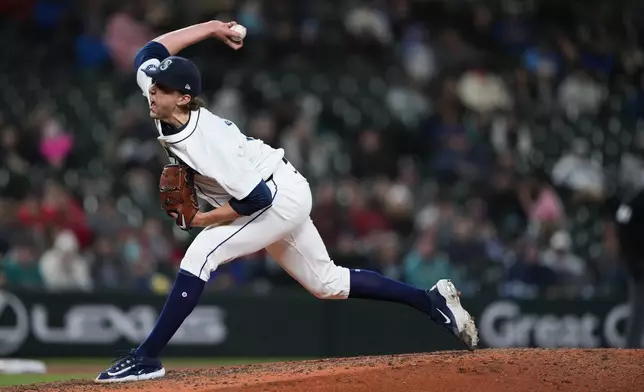Seattle Mariners starting pitcher Logan Gilbert throws to a Cincinnati Reds batter during the seventh inning of a baseball game Tuesday, April 16, 2024, in Seattle. (AP Photo/Lindsey Wasson)