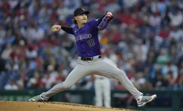 Colorado Rockies' Ryan Feltner pitches during the second inning of a baseball game against the Philadelphia Phillies, Wednesday, April 17, 2024, in Philadelphia. (AP Photo/Matt Rourke)