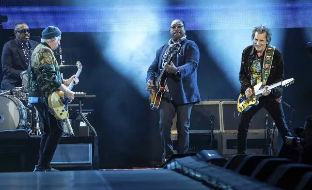 Keith Richards, left, Darryl Jones, and Ronnie Wood of The Rolling Stones perform during the first night of the U.S. leg of their "Hackney Diamonds" tour on Sunday, April 28, 2024, in Houston. (Photo by Amy Harris/Invision/AP)