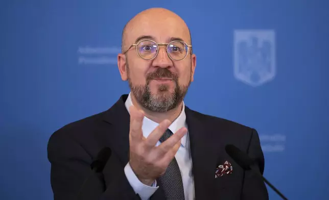 European Council President Charles Michel gestures during a press conference with Romanian President Klaus Iohannis at the Cotroceni Presidential Palace in Bucharest, Romania, Wednesday, April 3, 2024. (AP Photo/Andreea Alexandru)
