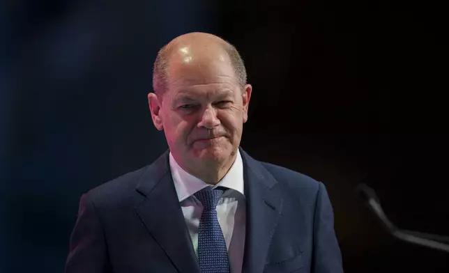 German Chancellor Olaf Scholz takes part in the Party of European Socialists (PES) Leaders Conference, at the Palace of the Parliament, the second largest administrative building in the world after the Pentagon, in Bucharest, Romania, Saturday, April 6, 2024. (AP Photo/Andreea Alexandru)