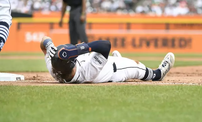 Detroit Tigers' Zach McKinstry reacts after getting picked off first base in the sixth inning of a baseball game against the Kansas City Royals, Sunday, April 28, 2024, in Detroit. (AP Photo/Jose Juarez)