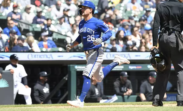 Kansas City Royals' Adam Frazier scores a run on a sacrifice fly by Bobby Witt Jr. in the third inning of a baseball game against the Detroit Tigers, Friday, April. 26, 2024, in Detroit. (AP Photo/Jose Juarez)