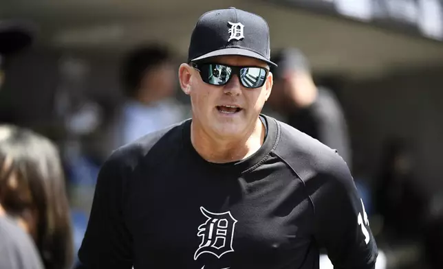 Detroit Tigers manager A.J. Hinch walks the dugout before a baseball game against the Kansas City Royals, Friday, April 26, 2024, in Detroit. (AP Photo/Jose Juarez)