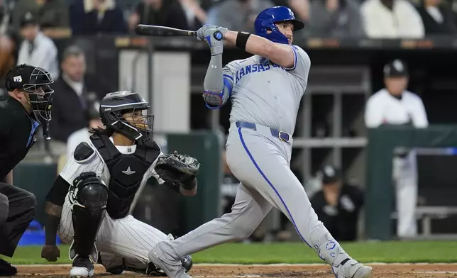 Kansas City Royals' Vinnie Pasquantino hits a home run during the fourth inning of a baseball game against the Chicago White Sox, Monday, April 15, 2024, in Chicago. (AP Photo/Erin Hooley)