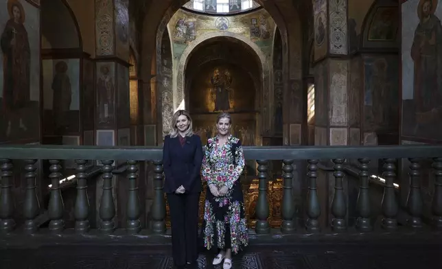 Britain's Duchess of Edinburgh Sophie, right, with the First Lady of Ukraine Olena Zelenska visit the Saint Sophia Cathedral in Kyiv, Monday April 29, 2024. (Anatolii Stepanov/Pool via AP)