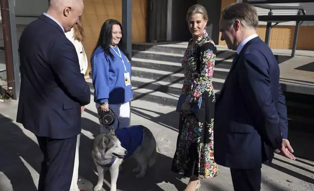 Britain's Sophie, Duchess of Edinburgh, second right, and Martin Harris, Ambassador of the United Kingdom to Ukraine, right, visit the UNFPA office in Kyiv to meet with war victims, Monday April 29, 2024. (Anatolii Stepanov/Pool via AP)