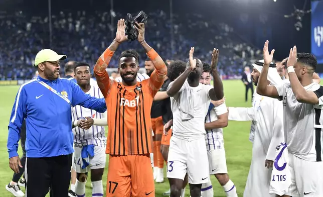 UAE's Al Ain' players celebrate after the second leg of their AFC Champions League 2023/24 semi-final match against Saudi Arabia's Al Hilal at Kingdom Arena Stadium in Riyadh, Saudi Arabia, Tuesday, April 23, 2024. (AP Photo)