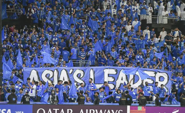 Saudi Arabia's Al Hilal fans support their team during the second leg of their AFC Champions League 2023/24 semi-final match gainst UAE's Al Ain at Kingdom Arena Stadium in Riyadh, Saudi Arabia,Tuesday, April 23, 2024. (AP Photo)