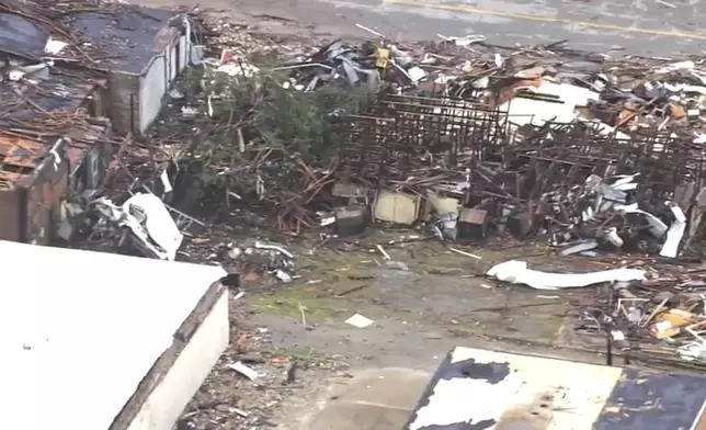 This image taken from video provided by KOCO shows buildings destroyed by a tornado in Sulphur, Okla., Sunday, April 28, 2024. (KOCO via AP)