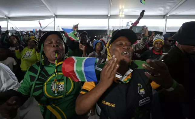 People attend Freedom Day celebrations in Pretoria, South Africa, Saturday April 27, 2024. The day marks April 27 when the country held pivotal first democratic election in 1994 that announced the official end of the racial segregation and oppression of apartheid. (AP Photo/Themba Hadebe)