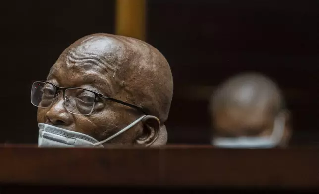FILE — Former South African President Jacob Zuma, sits in the High Court in Pietermaritzburg, South Africa, Tuesday Oct. 26, 2021 during his trial o corruption charges. For the first time since 1994, the ruling African National Congress (ANC) might receive less than 50% of votes after Zuma stepped down in disgrace in 2018 amid a swirl of corruption allegations and has given his support to the newly-formed UMkhonto WeSiizwe political party. (AP Photo/Jerome Delay, Pool, File)