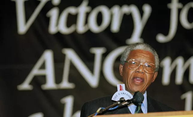 FILE — Nelson Mandela addresses supporters during victory celebrations in Johannesburg as he and the African National Congress are set to take power following the country's first racially integrated election, May 2, 1994. South Africans celebrate "Freedom Day" every April 27, when they remember their country's pivotal first democratic elections in 1994 that announced the official end of the racial segregation and oppression of apartheid. (AP Photo/John Parkin)