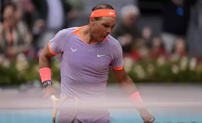 Rafael Nadal of Spain reacts after winning a point against Pedro Cachin of Argentina during the Mutua Madrid Open tennis tournament in Madrid, Spain, Monday, April 29, 2024. (AP Photo/Manu Fernandez)