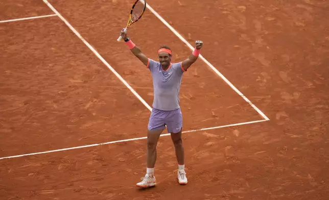 Rafael Nadal of Spain celebrates after defeating Pedro Cachin of Argentina during the Mutua Madrid Open tennis tournament in Madrid, Spain, Monday, April 29, 2024. (AP Photo/Manu Fernandez)