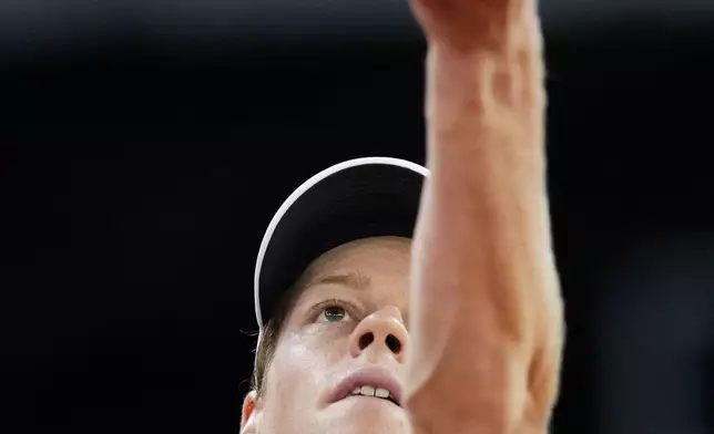 Jannik Sinner, of Italy, serves a ball to Lorenzo Sonego, of Italy, during the Mutua Madrid Open tennis tournament in Madrid, Saturday, April 27, 2024. (AP Photo/Manu Fernandez)