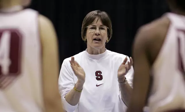 FILE - Stanford head coach Tara Vanderveer talks with team during practice at the women's NCAA college basketball regional tournament in Berkeley, Calif., Friday, March 27, 2009. VanDerveer, the winningest basketball coach in NCAA history, announced her retirement Tuesday night, April 9, 2024, after 38 seasons leading the Stanford women’s team and 45 years overall. (AP Photo/Paul Sakuma, File)