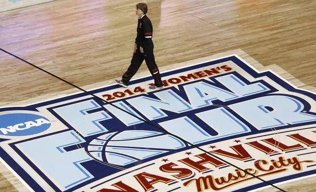 FILE - Stanford head coach Tara VanDerveer walks on the court during practice before the women's Final Four of the NCAA college basketball tournament, Saturday, April 5, 2014, in Nashville, Tenn. VanDerveer, the winningest basketball coach in NCAA history, announced her retirement Tuesday night, April 9, 2024, after 38 seasons leading the Stanford women’s team and 45 years overall. (AP Photo/John Bazemore, File)