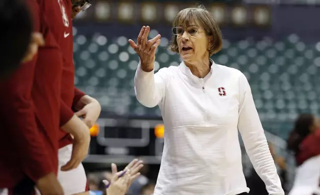 FILE - Stanford head coach Tara VanDerveer gestures towards her bench during the first quarter of an NCAA college basketball game against Grambling State, Saturday, Nov. 26, 2022, in Honolulu. VanDerveer, the winningest basketball coach in NCAA history, announced her retirement Tuesday night, April 9, 2024, after 38 seasons leading the Stanford women’s team and 45 years overall. (AP Photo/Marco Garcia)