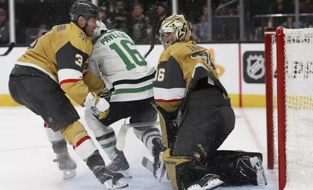 Vegas Golden Knights defenseman Brayden McNabb (3) and Dallas Stars center Joe Pavelski (16) collide and bump into Vegas Golden Knights goaltender Logan Thompson (36) during the third period in Game 3 of an NHL hockey Stanley Cup first-round playoff series Saturday, April 27, 2024, in Las Vegas. (AP Photo/Ian Maule)