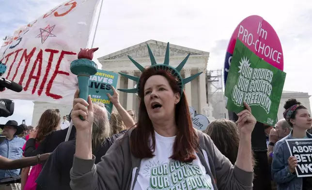 Abortion-rights activists rally outside the Supreme Court, Wednesday, April 24, 2024, in Washington. (AP Photo/Jose Luis Magana)