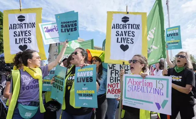 Abortion-rights activists rally outside the Supreme Court on Wednesday, April 24, 2024, in Washington. (AP Photo/Mariam Zuhaib)