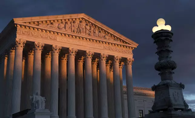 FILE - The Supreme Court is seen at sunset in Washington, on Jan. 24, 2019. On the left and right, Supreme Court justices seem to agree on a basic truth about the American system of government: No one is above the law, not even the president. (AP Photo/J. Scott Applewhite)
