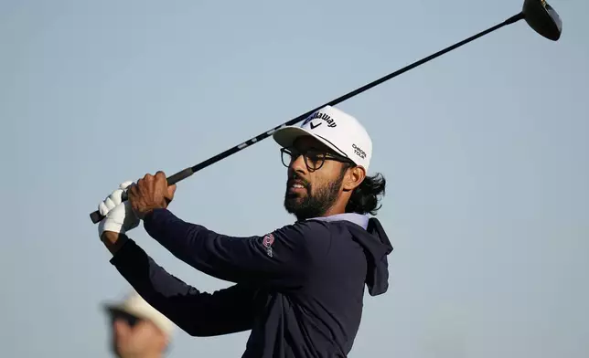 Akshay Bhatia watches his tee shot on the 11th hole during the second round of the Texas Open golf tournament, Friday, April 5, 2024, in San Antonio. (AP Photo/Eric Gay)