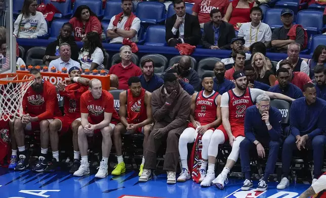 The New Orleans Pelicans bench watches late in the second half of Game 3 of an NBA basketball first-round playoff series against the Oklahoma City Thunder in New Orleans, Saturday, April 27, 2024. The Thunder won 106-85. (AP Photo/Gerald Herbert)