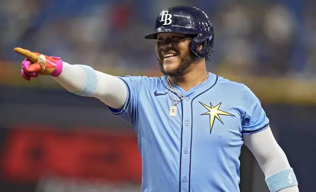 Tampa Bay Rays' Harold Ramirez celebrates after his single off Detroit Tigers starting pitcher Jack Flaherty during the fourth inning of a baseball game Wednesday, April 24, 2024, in St. Petersburg, Fla. (AP Photo/Chris O'Meara)