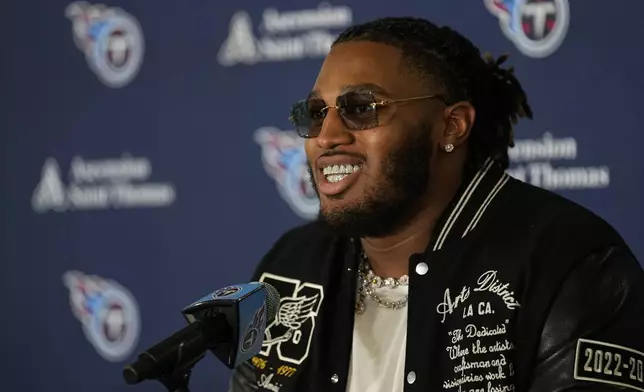 Tennessee Titans first round draft pick JC Latham speaks at an NFL football news conference Friday, April 26, 2024, in Nashville, Tenn. (AP Photo/George Walker IV)