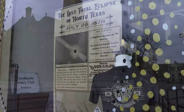 The Ellis County Museum displays newspaper article excerpts and headlines from the region’s last total solar eclipse in 1878 in Waxahachie, Texas on Saturday, April 6, 2024. Waxahachie will be in the path of totality for Monday's eclipse of the sun. (AP Photo/Laura Bargfeld)