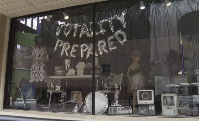 An antique shop displays “Totality Prepared” sign ahead of the solar eclipse in Waxahachie, Texas on Saturday, April 6, 2024. Waxahachie will be in the path of totality for Monday's eclipse of the sun. (AP Photo/Laura Bargfeld)