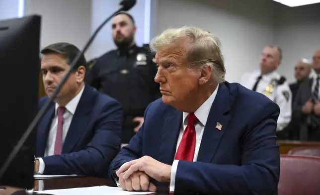 Former President Donald Trump attends the first day of his criminal trial, at Manhattan Criminal Court in New York City on April 15, 2024. (Angela Weiss/AFP via AP Pool)