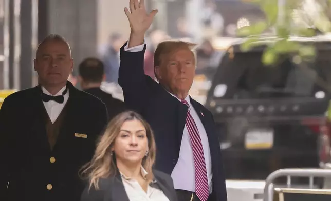 Former president Donald Trump leaves Trump Tower on his way to Manhattan criminal court, Friday, April 19, 2024, in New York. Jury selection in the hush money trial of former President Donald Trump is set to resume after a frenetic day that eventually saw all 12 jurors sworn in along with one alternate juror. (AP Photo/Yuki Iwamura)