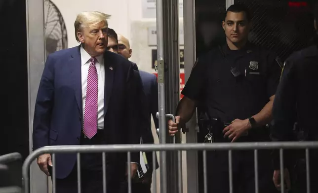 Former President Donald Trump arrives at Manhattan Criminal Court on Friday, April 19, 2024 in New York. (Spencer Platt/Pool Photo via AP)