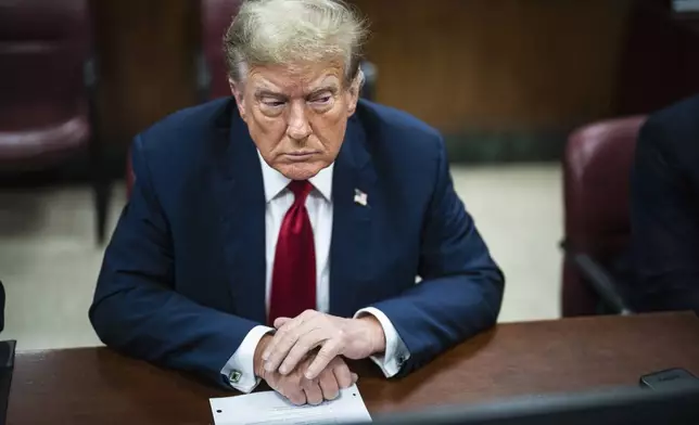 FILE - Former President Donald Trump is pictured in a Manhattan criminal court ahead of the start of jury selection in New York on April 15, 2024. The first day of Trump's history-making trial in Manhattan ended Monday with no one yet chosen to be among the panel of 12 jurors and six alternates. Dozens of people were dismissed after saying they didn't believe they could be fair, though dozens of other prospective jurors have yet to be questioned. (Photo by Jabin Botsford/Washington Post via AP, Pool, File)